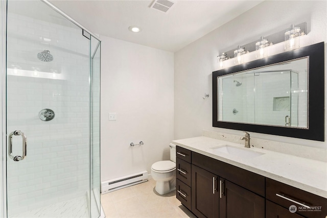 bathroom featuring tile patterned flooring, toilet, vanity, a baseboard heating unit, and an enclosed shower