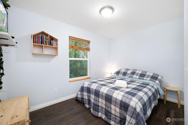 bedroom featuring dark hardwood / wood-style floors