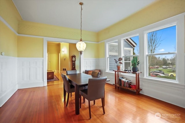 dining room with hardwood / wood-style floors