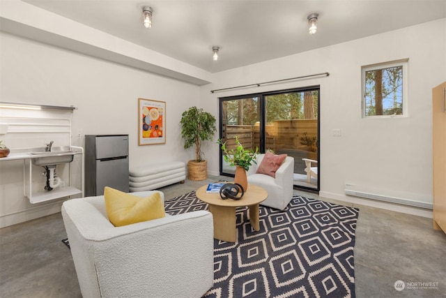living room with concrete flooring