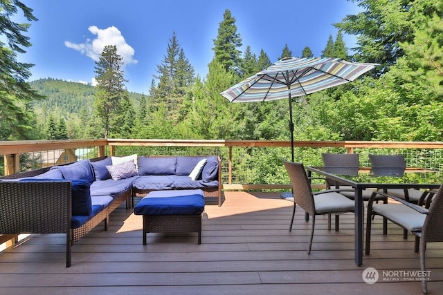 wooden deck with outdoor lounge area