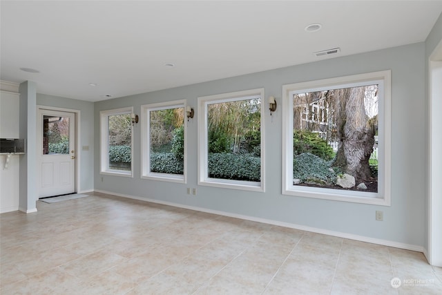 interior space featuring light tile patterned floors