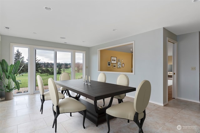 dining room featuring light tile patterned flooring