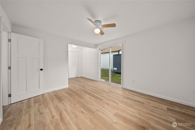 unfurnished bedroom with ceiling fan and light hardwood / wood-style floors