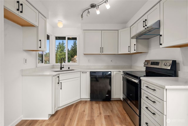 kitchen featuring white cabinetry, dishwasher, electric range, and sink