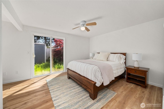 624 Geneva Ln SE, Olympia, WA 98513 - bedroom featuring baseboards, access to outside, a ceiling fan, and wood finished floors