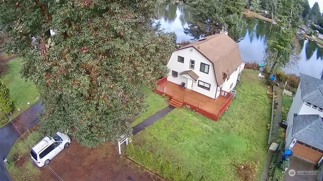 drone / aerial view featuring a water view