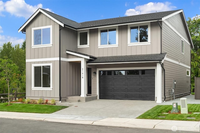 21416 116th Ave SE Unit 6, Kent, WA 98031 - view of front facade with roof with shingles, driveway, an attached garage, and board and batten siding