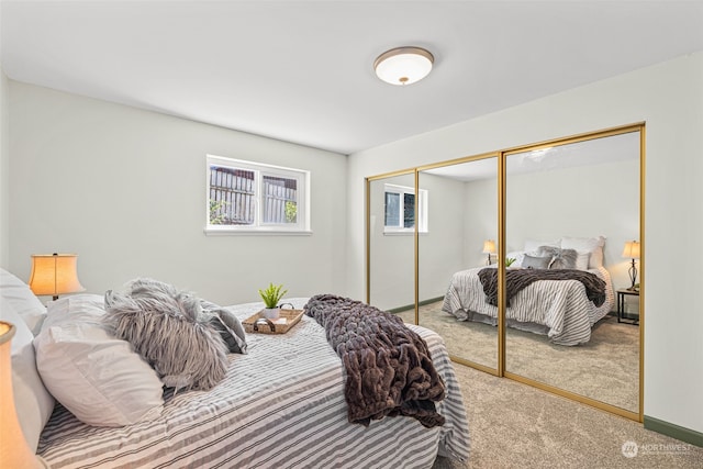 bedroom featuring a closet and carpet floors