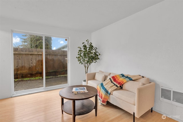 living room with light hardwood / wood-style floors