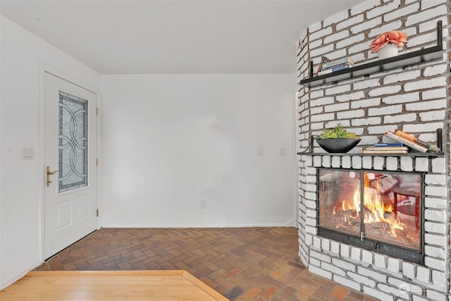 unfurnished living room with a fireplace