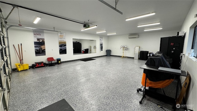 garage featuring a garage door opener and an AC wall unit