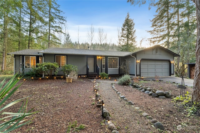 single story home featuring a garage