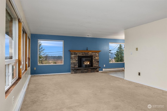 unfurnished living room with a baseboard heating unit, light colored carpet, and a stone fireplace