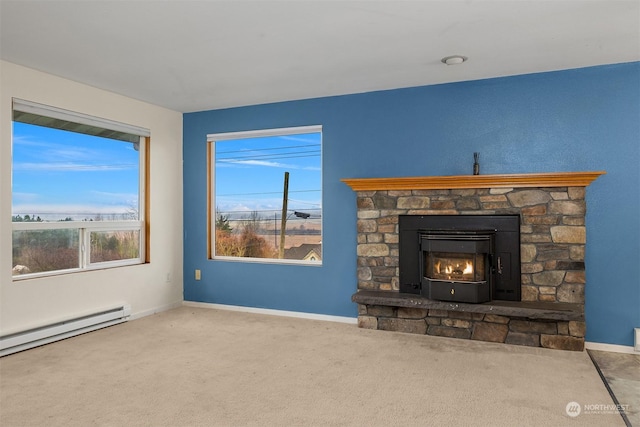 unfurnished living room with carpet flooring and a baseboard radiator