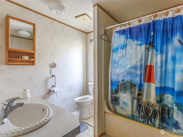 full bathroom featuring toilet, a textured ceiling, shower / bath combo with shower curtain, ornamental molding, and vanity