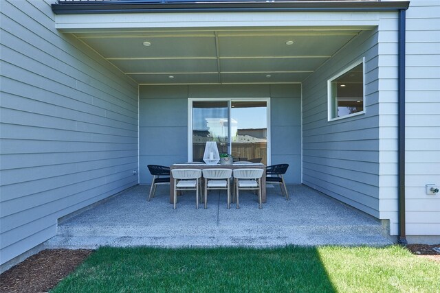 view of patio with outdoor dining area