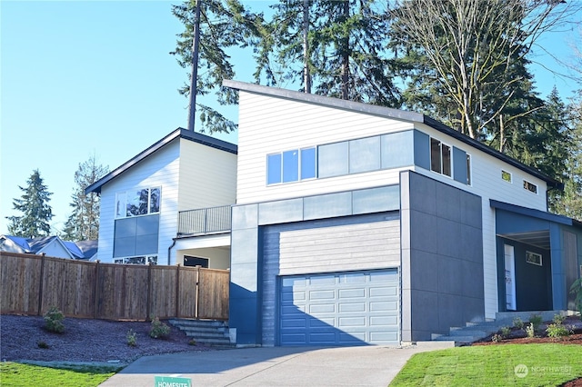 contemporary house featuring a garage