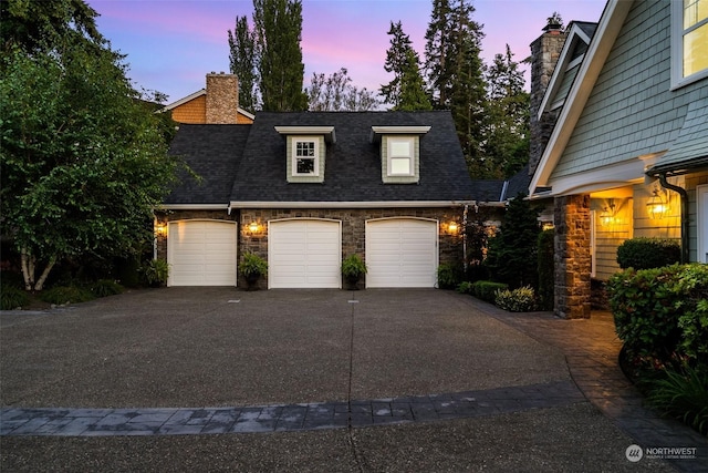 view of front of home featuring a garage