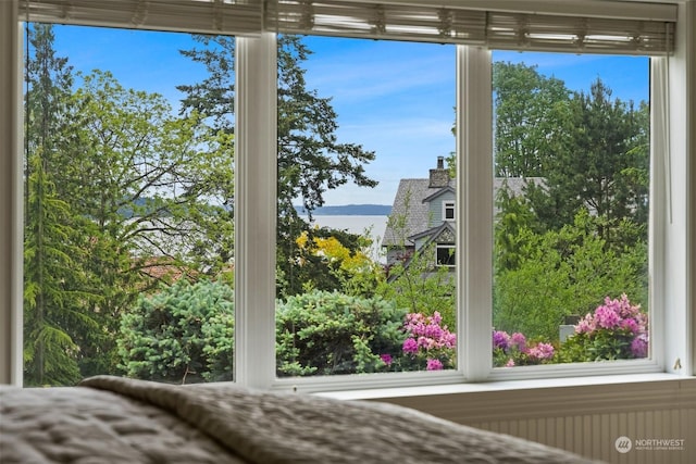 unfurnished bedroom with a water view