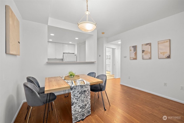 dining area featuring light hardwood / wood-style floors