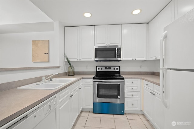 kitchen featuring white cabinetry and stainless steel appliances