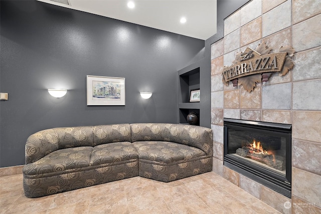 living room featuring a fireplace