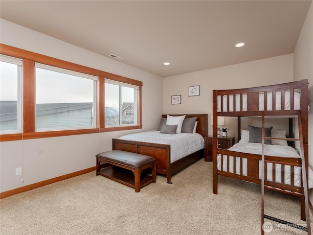 bedroom featuring recessed lighting, visible vents, baseboards, and light carpet