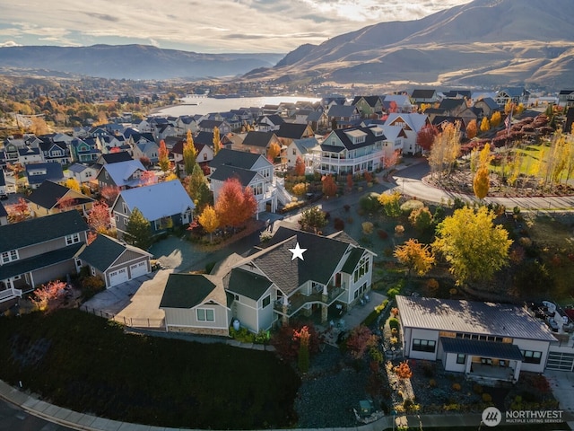 aerial view featuring a residential view and a mountain view