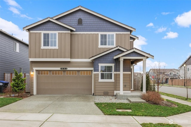 craftsman-style house featuring a garage