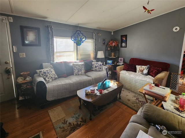 living room with hardwood / wood-style floors and an inviting chandelier