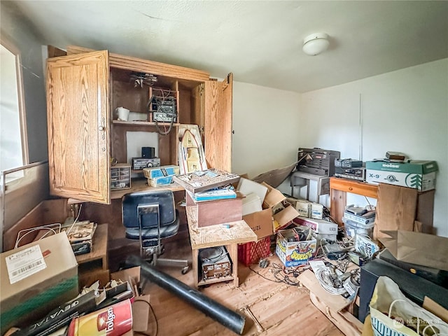 miscellaneous room featuring hardwood / wood-style floors