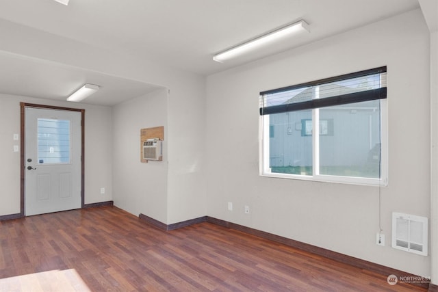 entrance foyer featuring dark hardwood / wood-style flooring