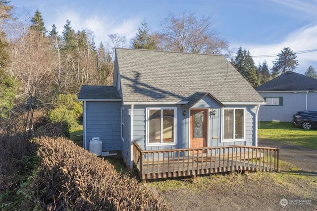 view of front of home with a wooden deck