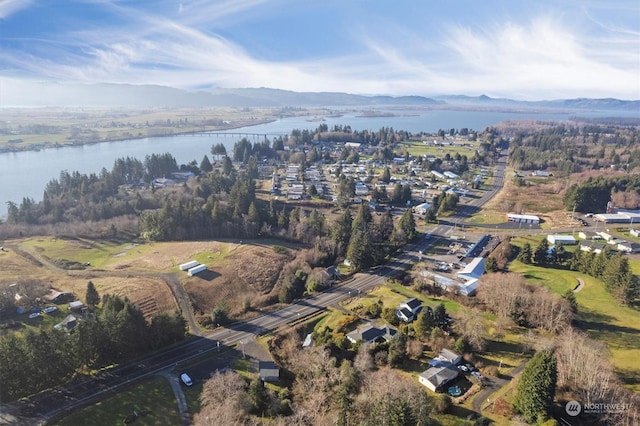 aerial view with a water and mountain view