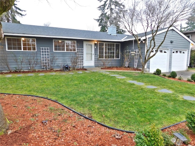 single story home featuring a front yard and a garage