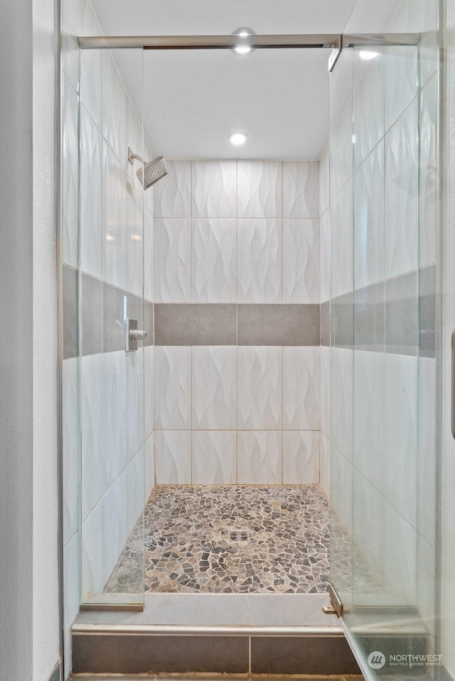 bathroom with an enclosed shower