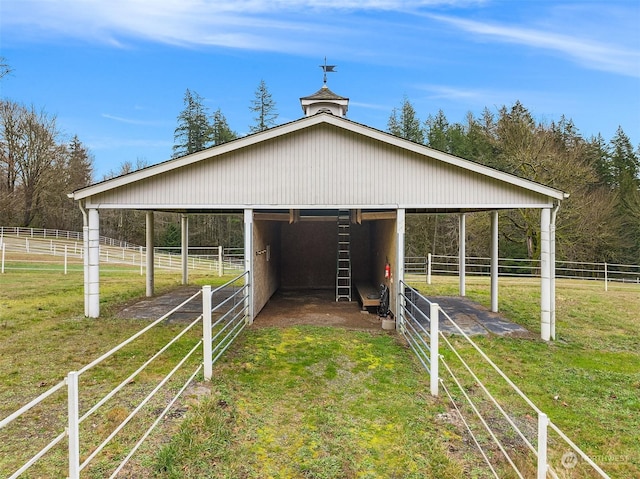 view of outbuilding featuring a rural view