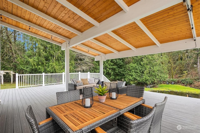 deck with an outdoor hangout area