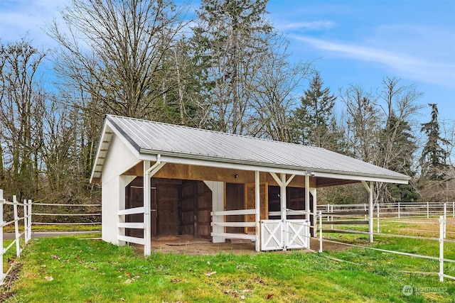 view of outdoor structure featuring a rural view