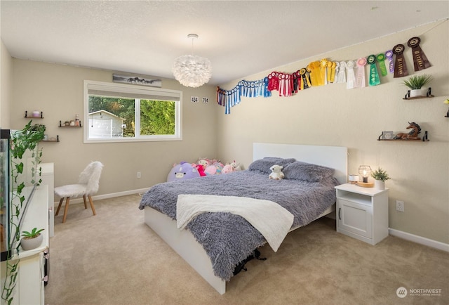 bedroom with light colored carpet