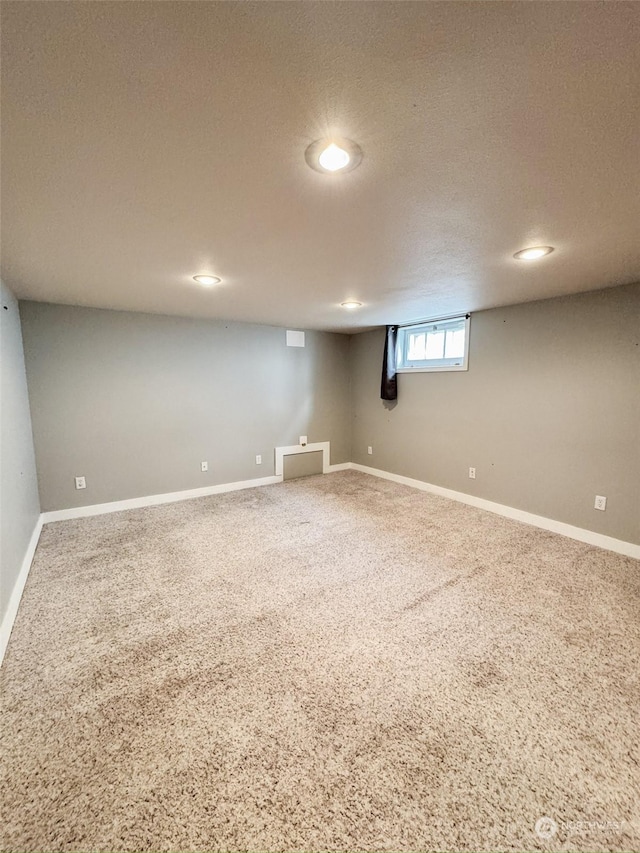 basement with carpet flooring