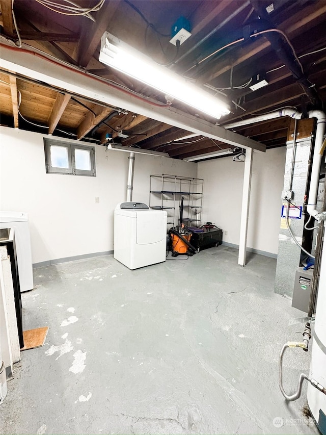 basement featuring washer and clothes dryer