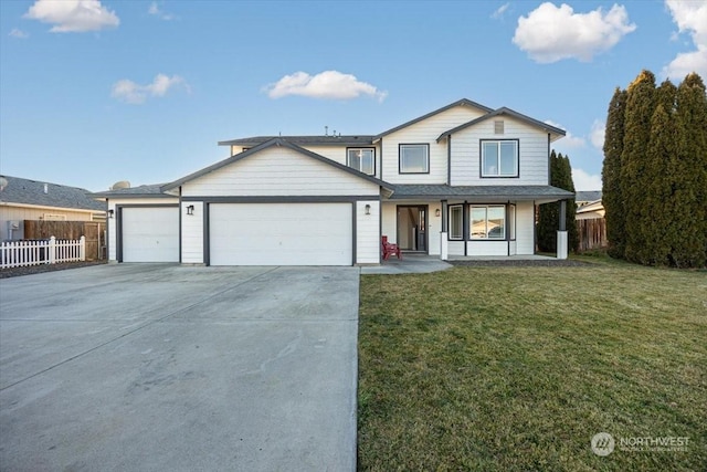 view of front property with a front lawn and a garage