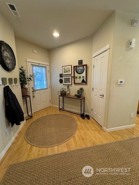 foyer entrance featuring light wood-type flooring