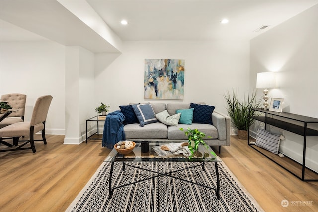 living room with hardwood / wood-style flooring