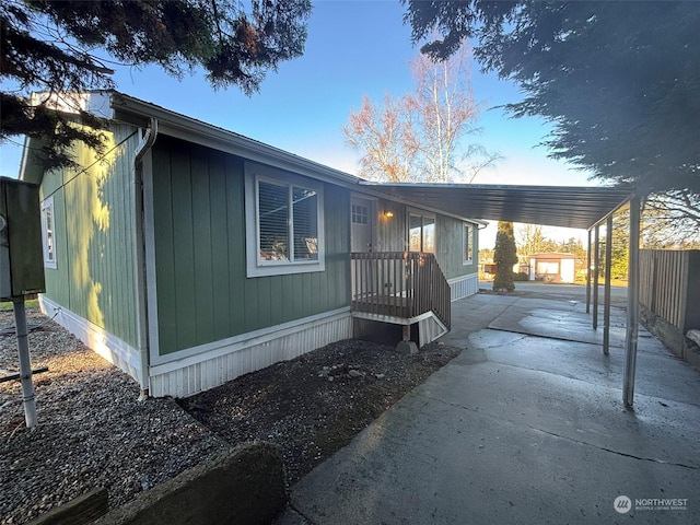 view of home's exterior with a carport