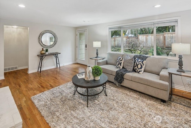 living room with hardwood / wood-style floors