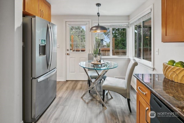 dining room featuring light wood-type flooring