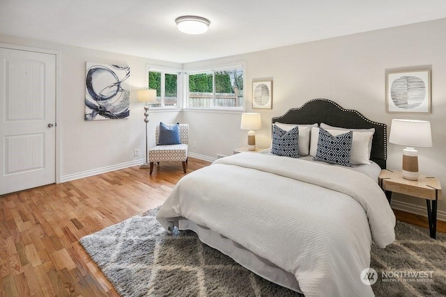 bedroom with wood-type flooring